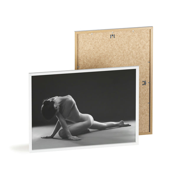 Nude woman doing yoga pose in black and white in white frame
